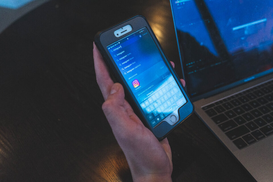 Person engaging with followers on social media